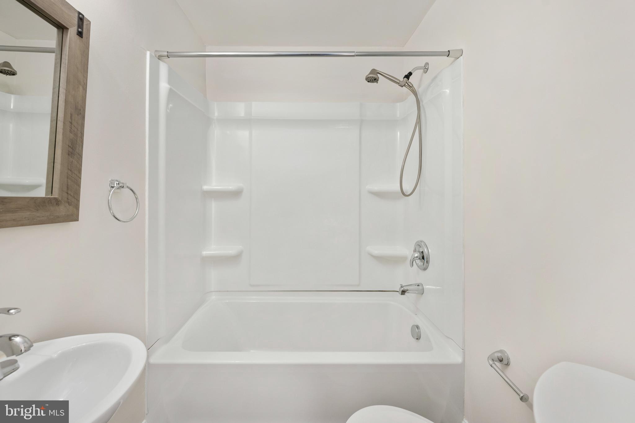 246 Berry Street Orange, VA 22960 - Photo 36 of 46 a bathroom with a bath tub with a shower