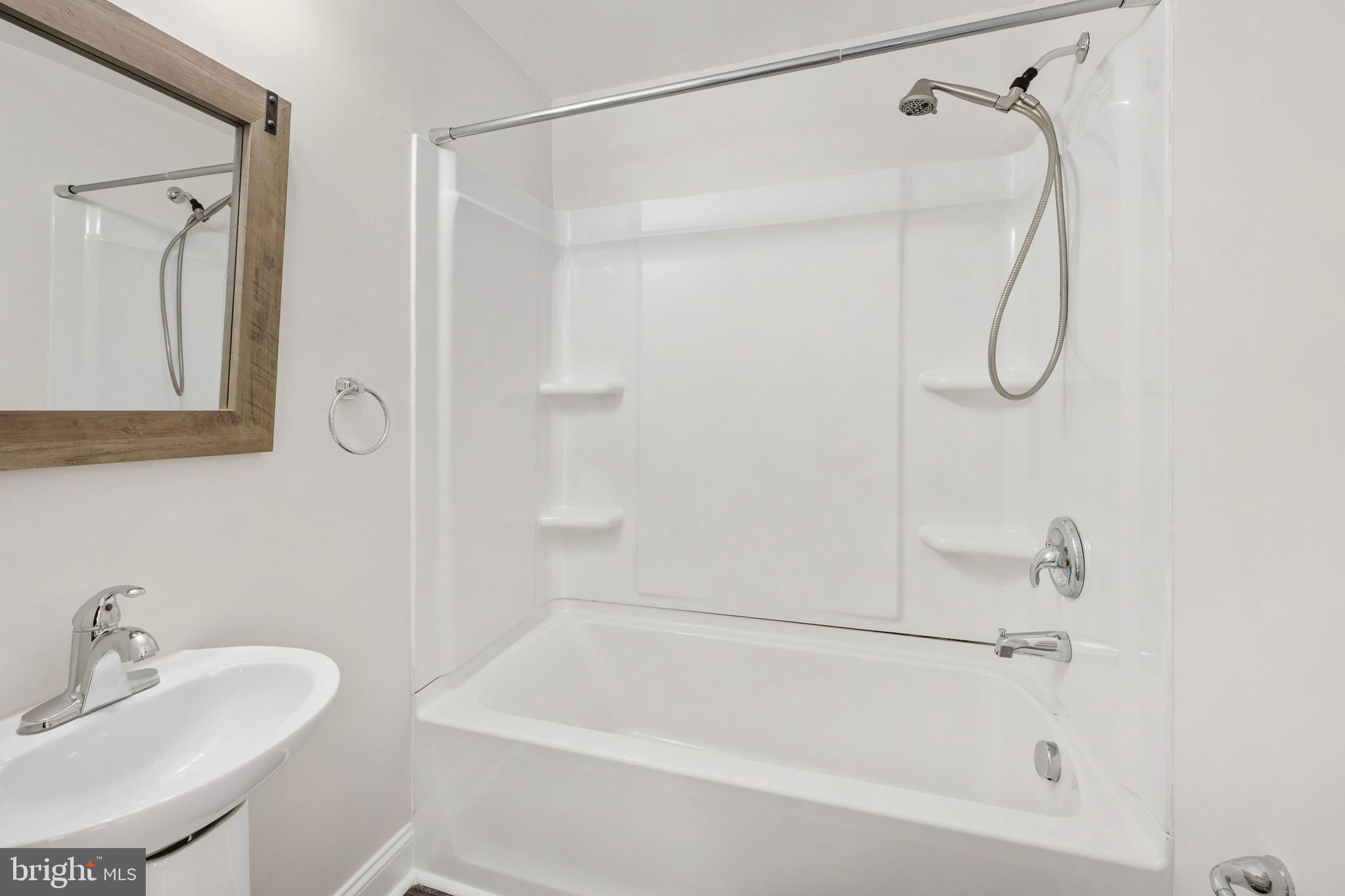 246 Berry Street Orange, VA 22960 - Photo 37 of 46 a bathroom with a bath tub with a sink