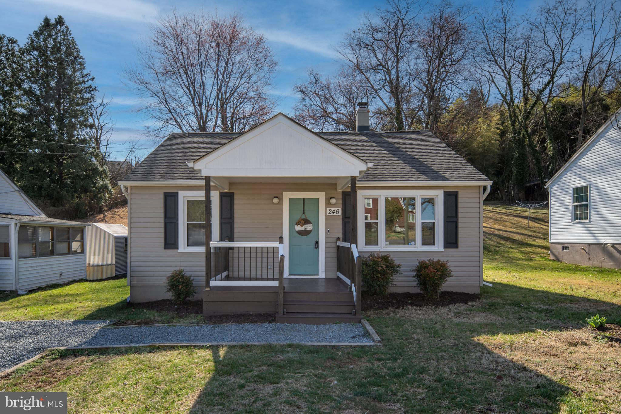 246 Berry Street Orange, VA 22960 - Photo 6 of 46 a view of a house with garden and trees in the background