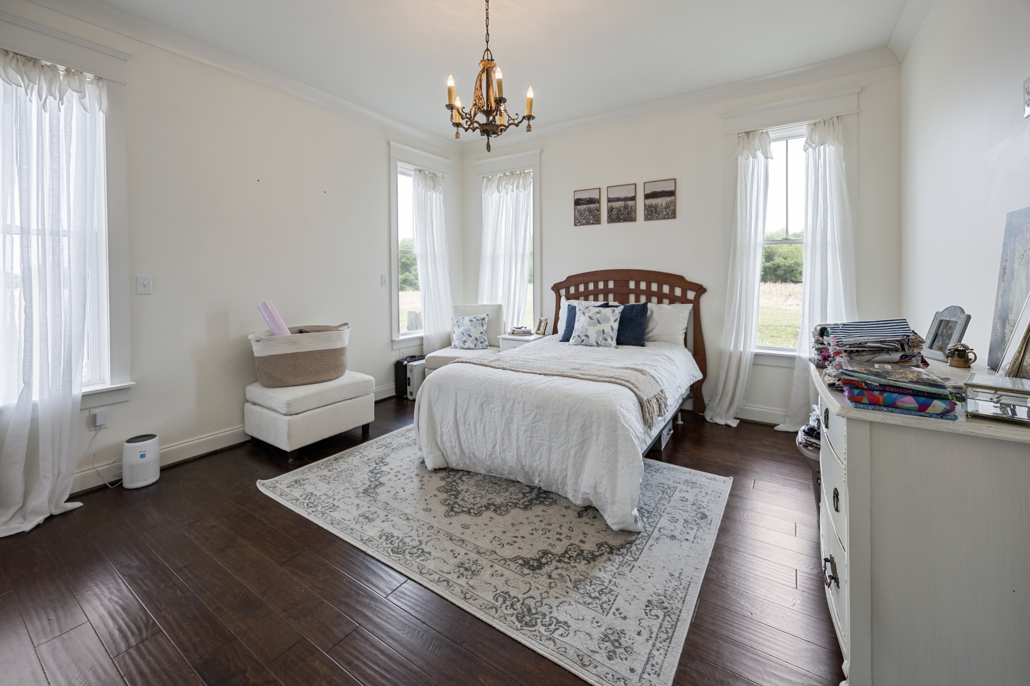 1687 Georgia Crossing Road Winchester, TN 37398 - Photo 10 of 38 a spacious bedroom with a bed couch and a window