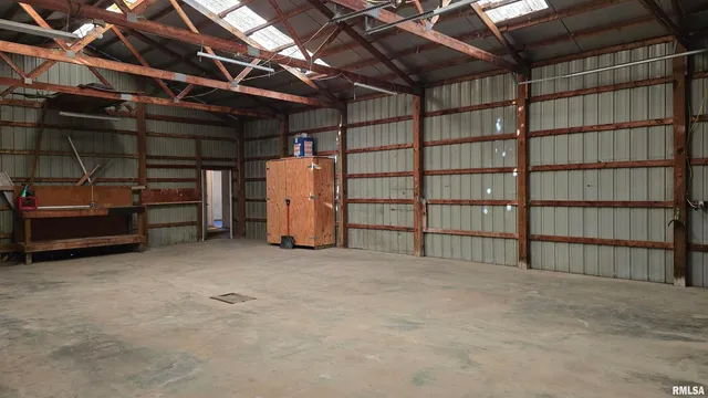 a view of an empty room with storage