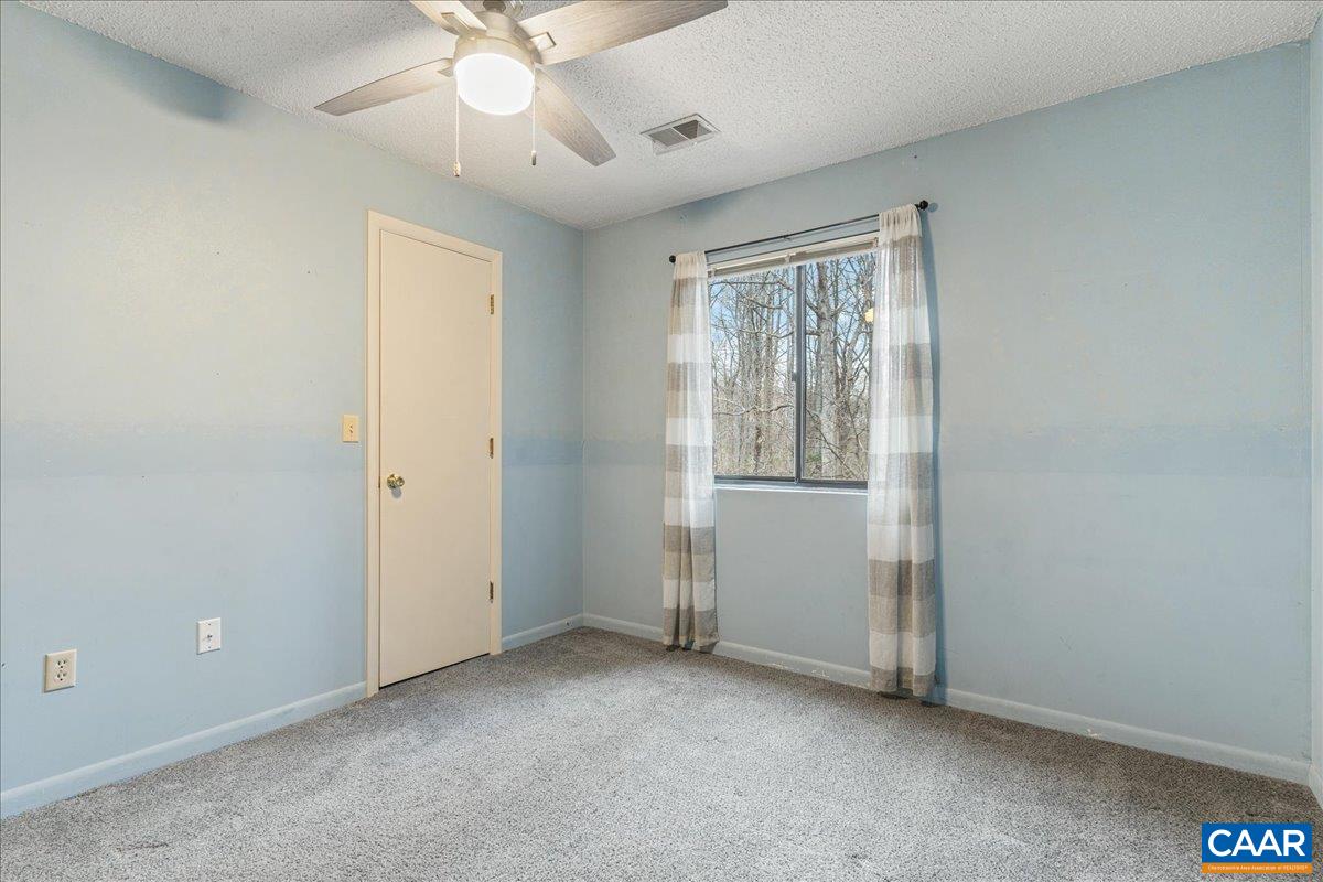 113 Turtle Creek Road, Unit 6 Charlottesville, VA 22901 - Photo 16 of 33 a view of an empty room with a window