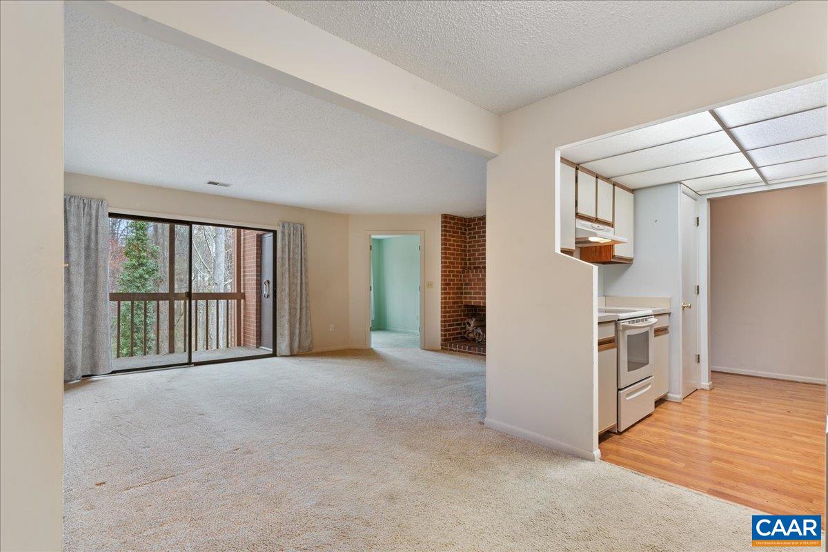 113 Turtle Creek Road, Unit 6 Charlottesville, VA 22901 - Photo 8 of 33 a view of an empty room with a window