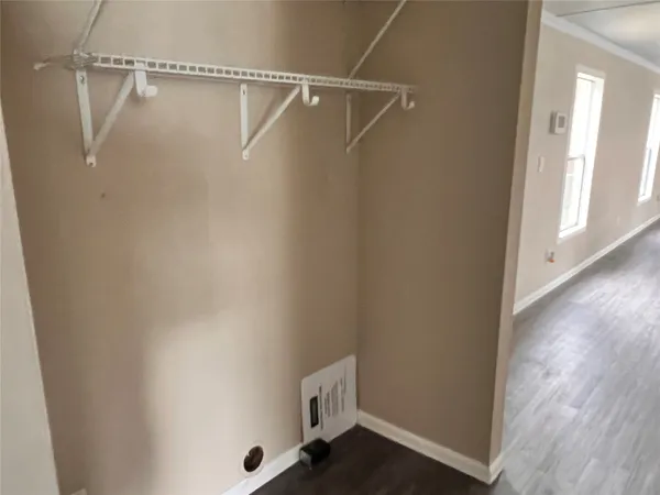 a view of an empty walk in closet