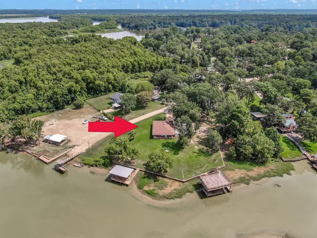 view of outdoor space with seating area and trees in the background