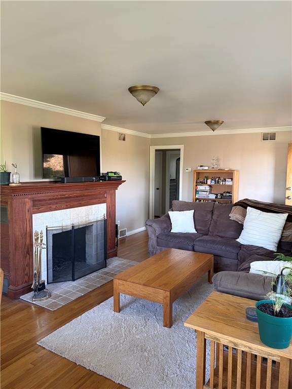 359 Dorseyville Road Pittsburgh, PA 15215 - Photo 2 of 29 a living room with furniture and a fireplace