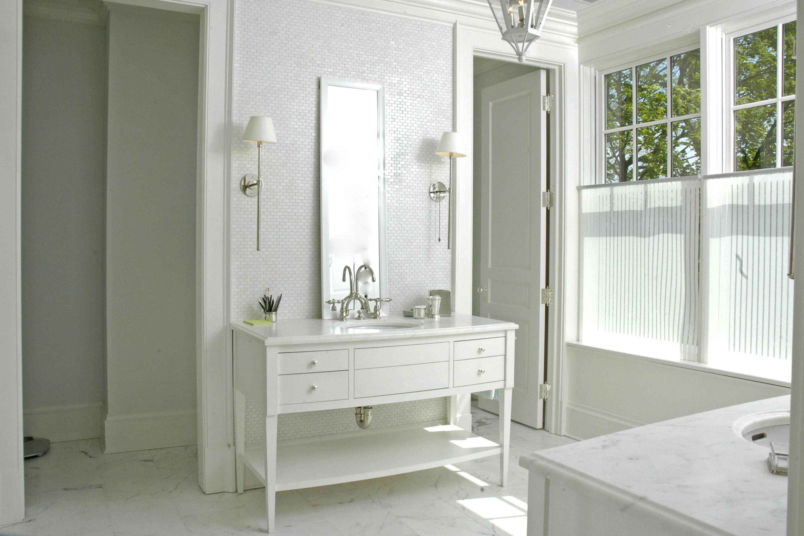 11 Harbor Bluff Lane Rowayton, CT 06853 - Photo 17 of 31 a room with a sink and a mirror