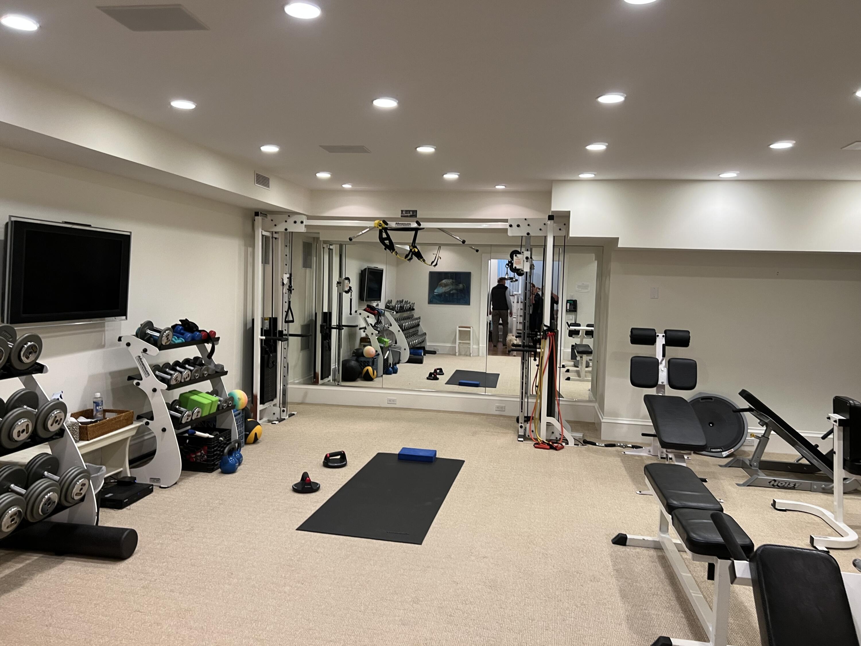 11 Harbor Bluff Lane Rowayton, CT 06853 - Photo 22 of 31 a view of a room with gym equipment
