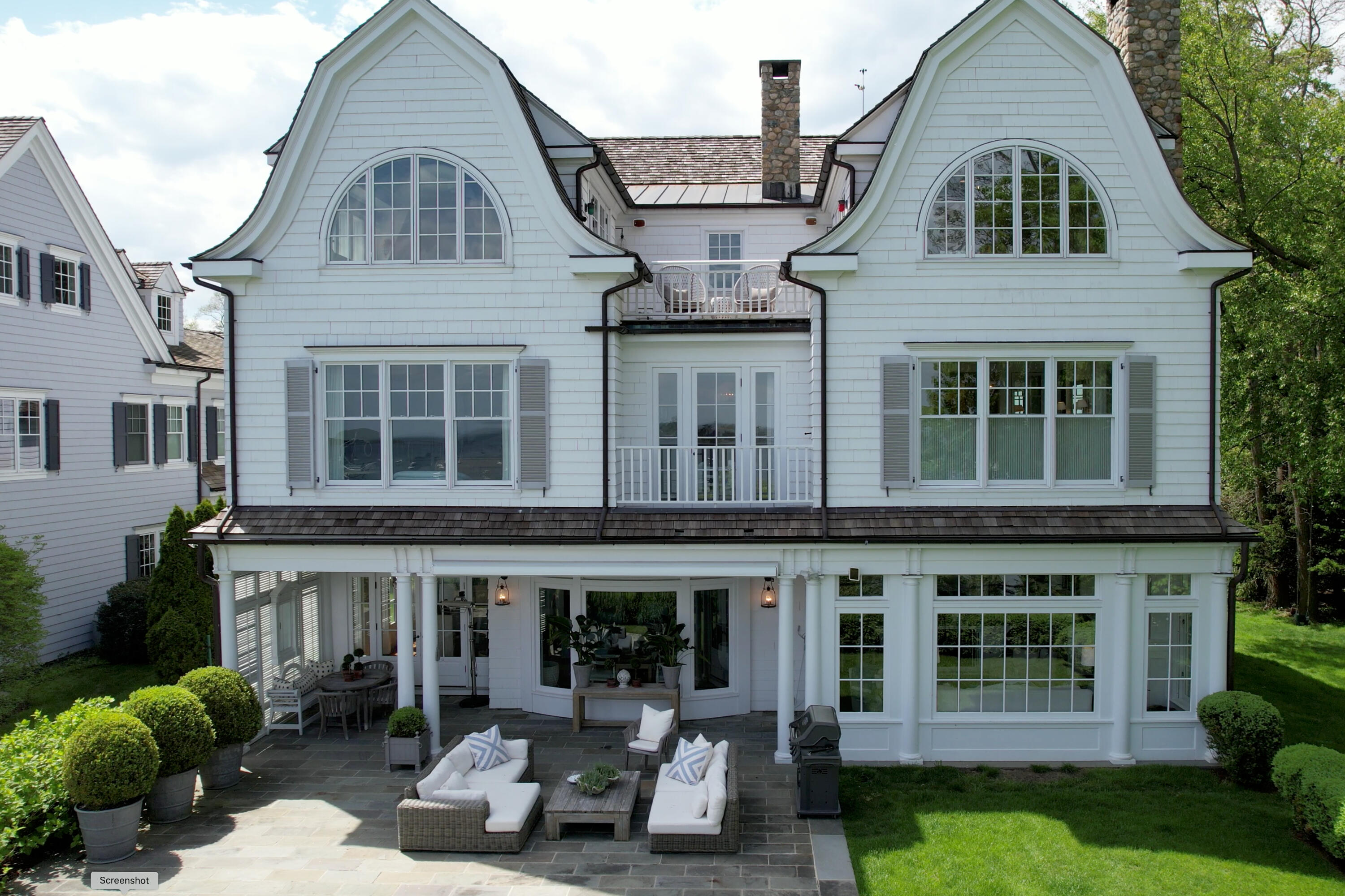 11 Harbor Bluff Lane Rowayton, CT 06853 - Photo 27 of 31 a front view of a house with garden