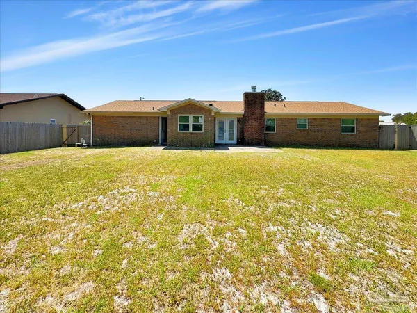 a house view with a ocean view