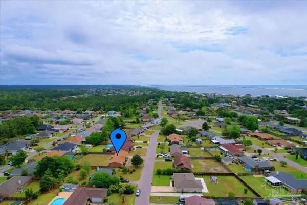 a view of a lake with a house