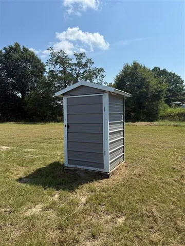 a house view with a garden space