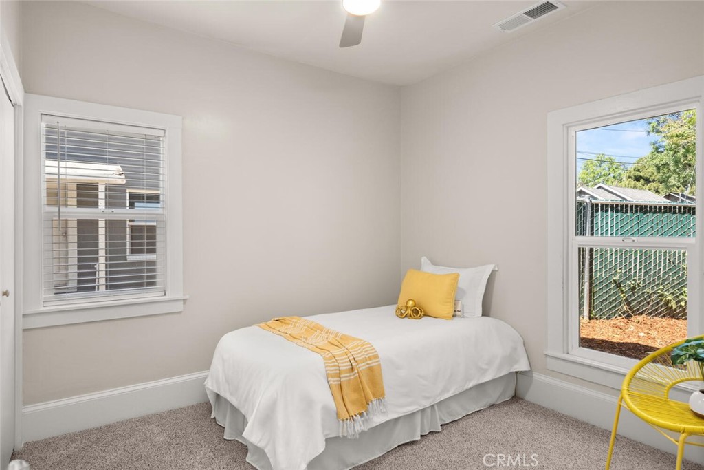 1336 Chestnut Street Chico, CA 95928 - Photo 19 of 41 a bedroom with a bed and a window