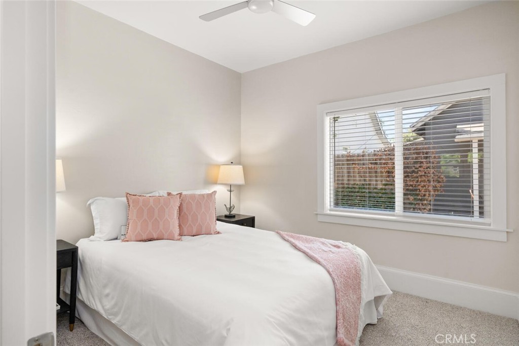 1336 Chestnut Street Chico, CA 95928 - Photo 22 of 41 a bedroom with a bed and a large window