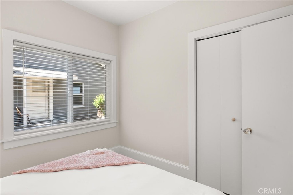 1336 Chestnut Street Chico, CA 95928 - Photo 23 of 41 a bedroom with a bed and a window