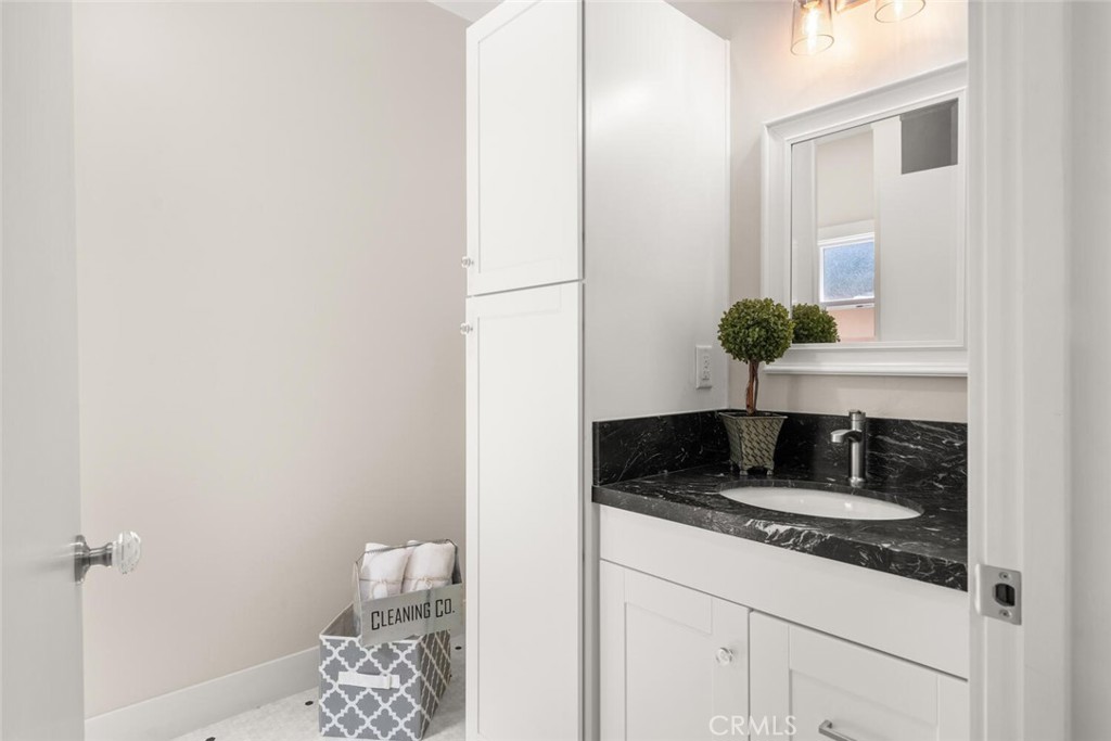 1336 Chestnut Street Chico, CA 95928 - Photo 24 of 41 a kitchen with granite countertop a sink and a stove