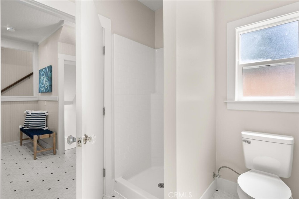 1336 Chestnut Street Chico, CA 95928 - Photo 25 of 41 a bathroom with a toilet and a window