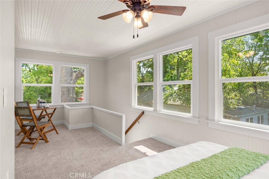 1336 Chestnut Street Chico, CA 95928 - Photo 32 of 41 a spacious bedroom with a large bed and a large window