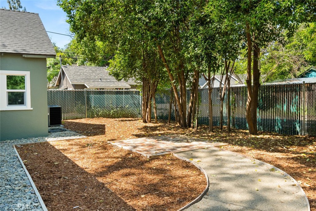 1336 Chestnut Street Chico, CA 95928 - Photo 38 of 41 a view of a house with backyard and tree