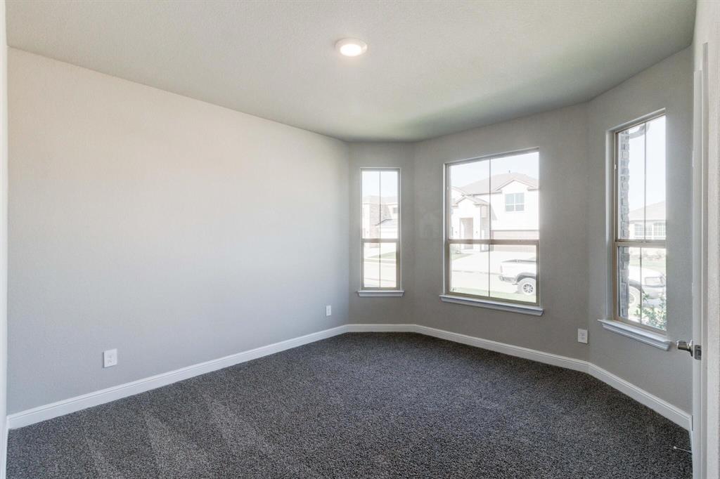 15524 Balham Pass Fort Worth, TX 76247 - Photo 2 of 10 an empty room with a window