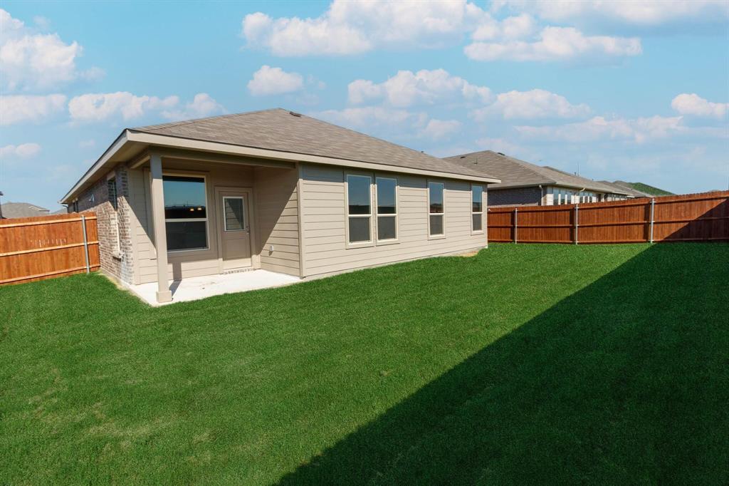 15524 Balham Pass Fort Worth, TX 76247 - Photo 10 of 10 a view of a house with a backyard