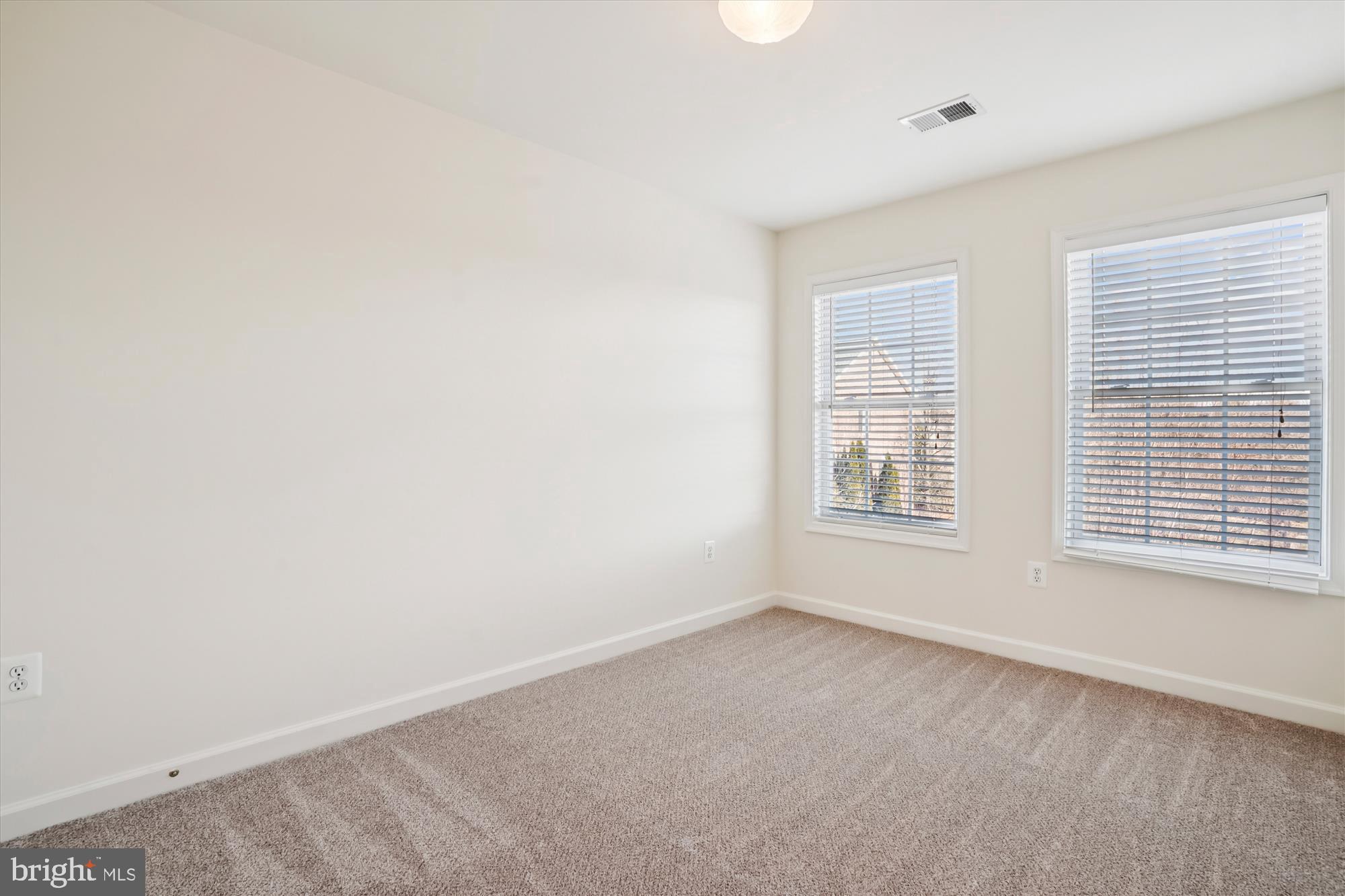 796 Col Edmonds Court Warrenton, VA 20186 - Photo 23 of 47 an empty room with a window