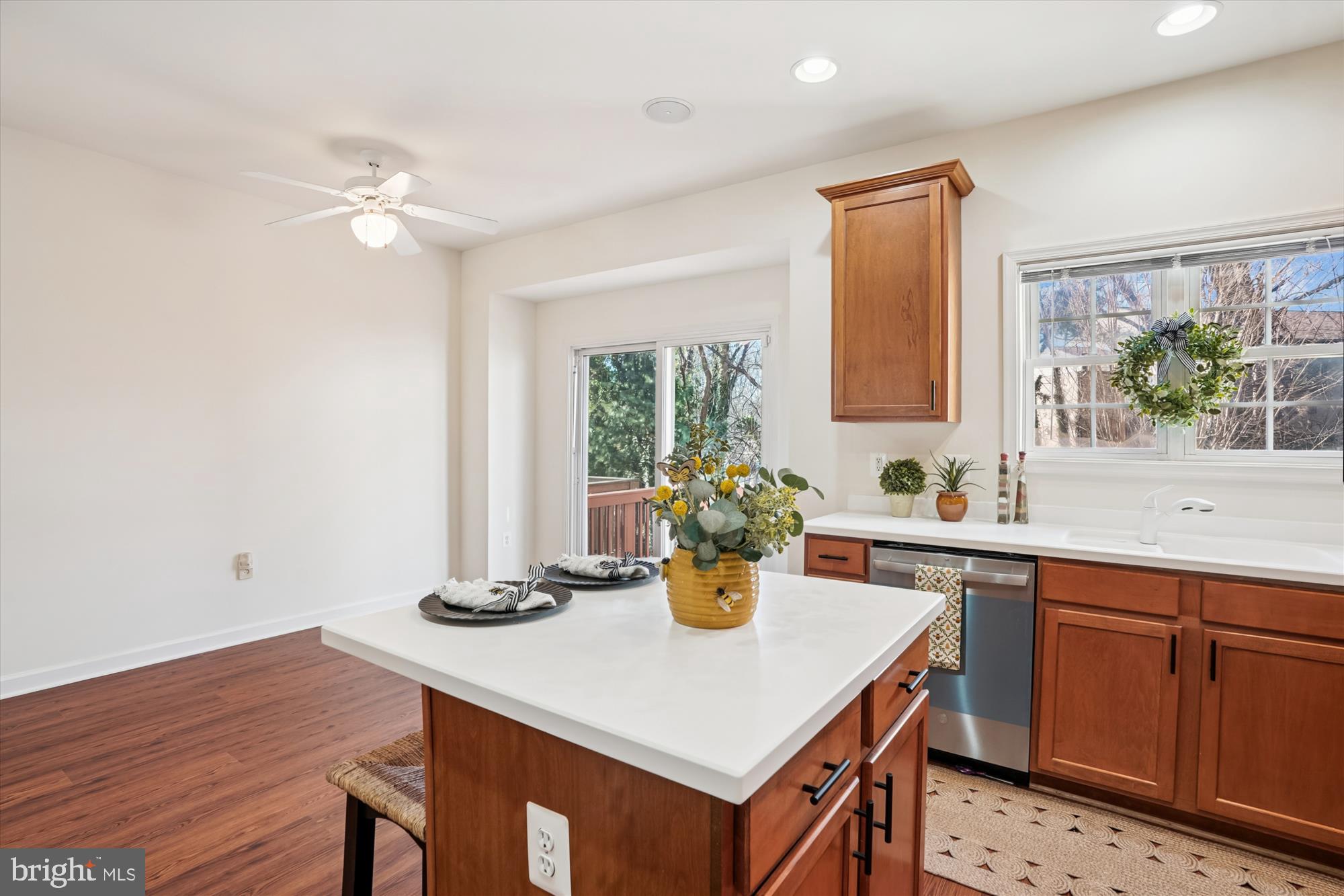 796 Col Edmonds Court Warrenton, VA 20186 - Photo 5 of 47 a kitchen with a table chairs and wooden floor