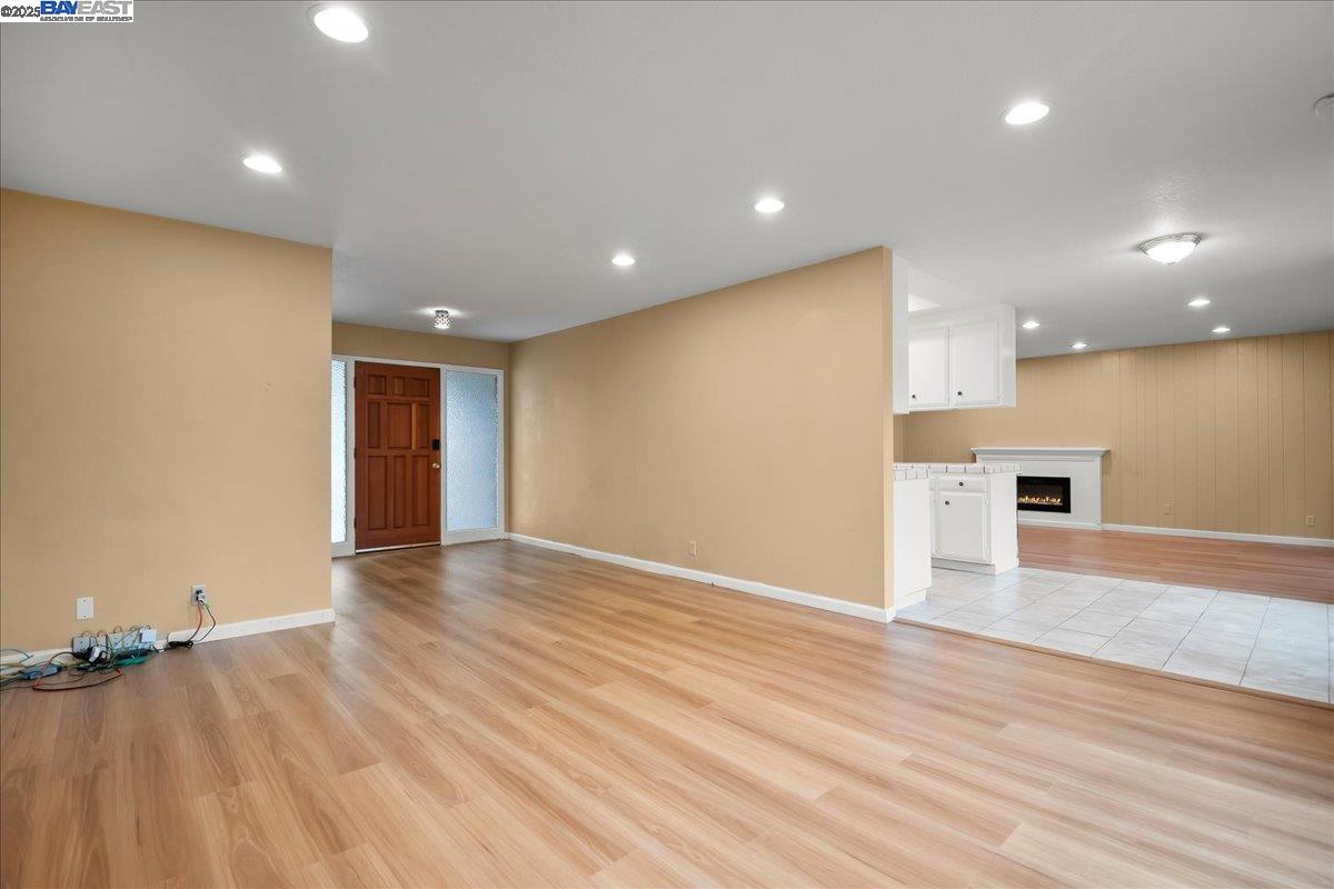 1043 Bonner Avenue Fremont, CA 94536 - Photo 3 of 16 a view of an empty room with wooden floor