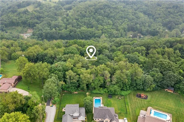 a view of a wooden house with a lake view