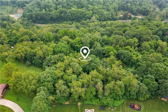 a view of lake with green space
