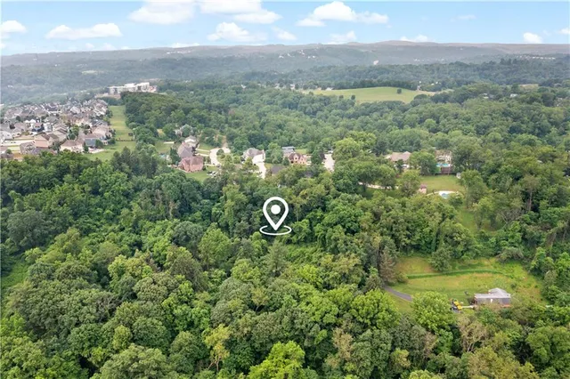 a view of a lake with a city