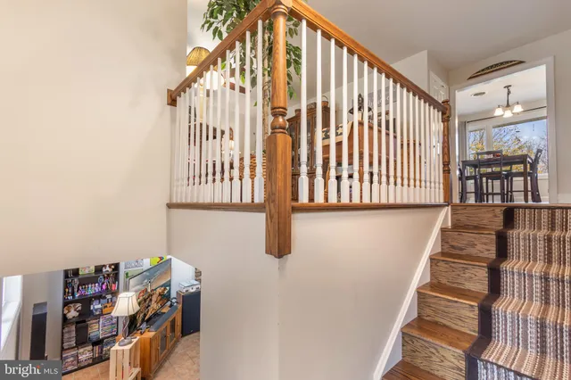 a view of entryway with stairs and furniture