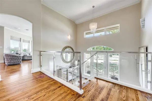 a view of a living room and hardwood floor