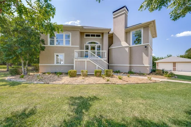 a front view of house with yard