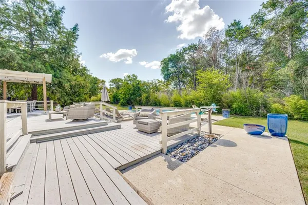 a view of a patio with swimming pool