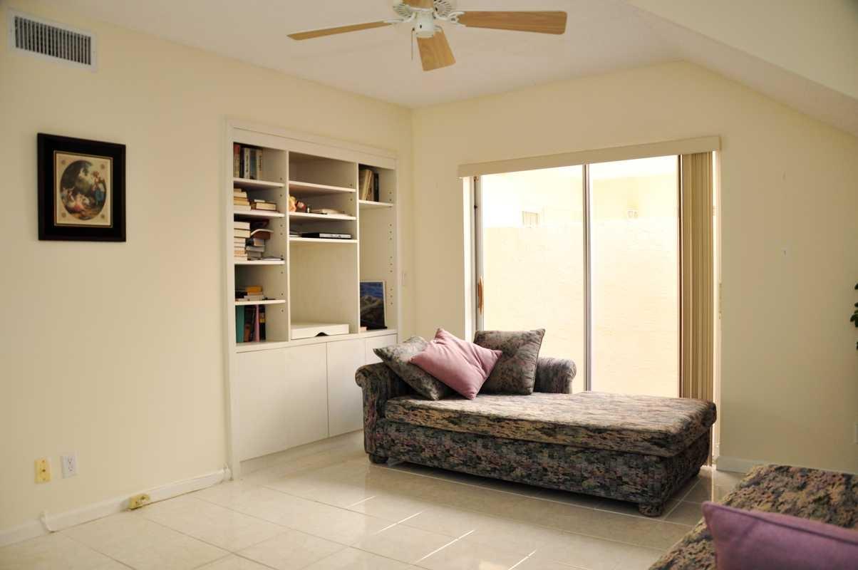 17288 Boca Club Boulevard, Unit 2001 Boca Raton, FL 33487 - Photo 16 of 25 a living room with furniture and a window