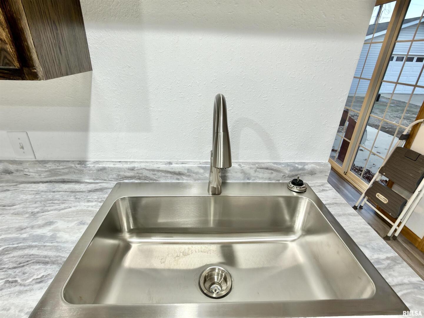 274 Oaktree Avenue Salem, IL 62881 - Photo 12 of 45 a close view of sink and tap