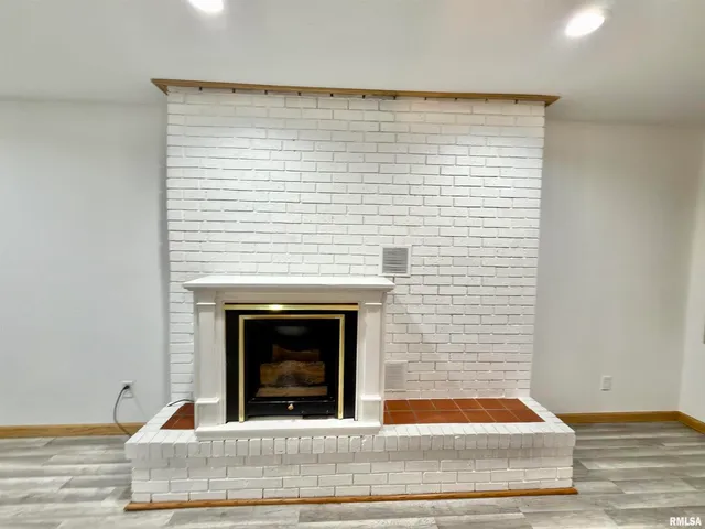 a view of a room that has a large window