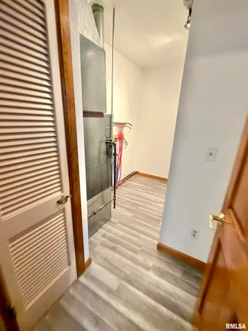 a bathroom with a sink a vanity and a mirror