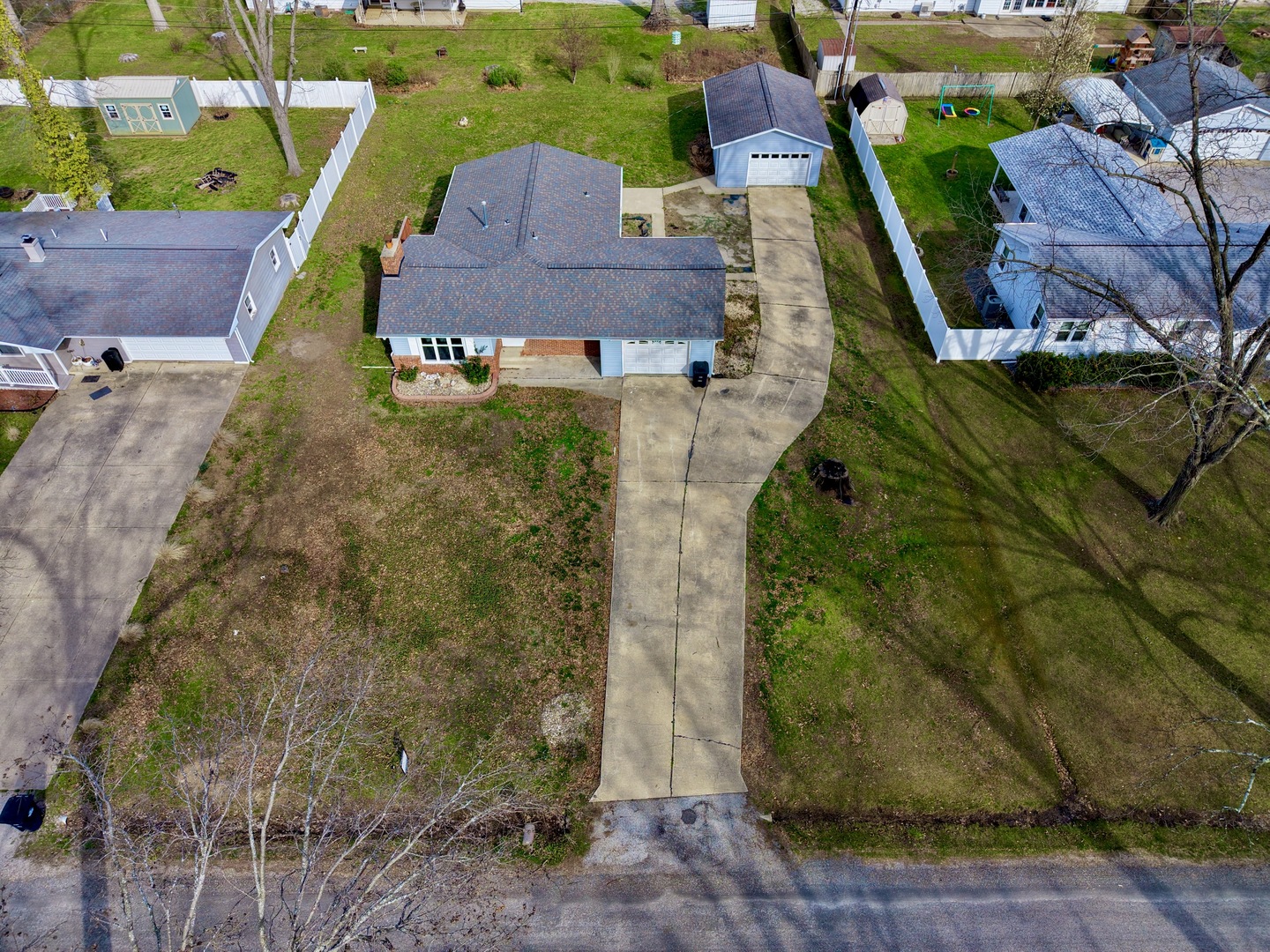 274 Oaktree Avenue Salem, IL 62881 - Photo 7 of 45 a aerial view of a house with a garden and trees