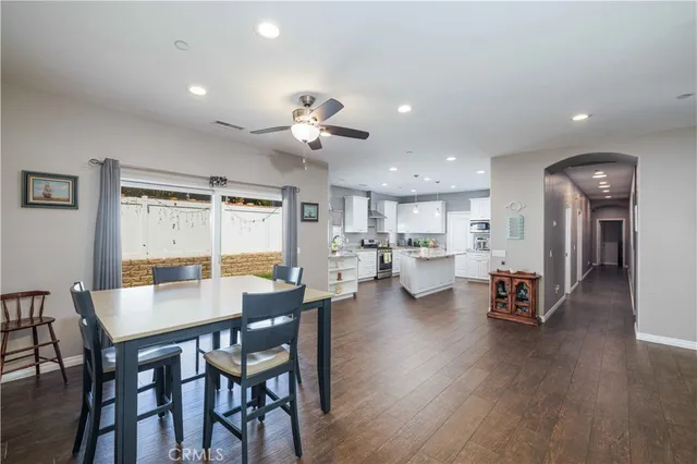 a room with furniture and a flat screen tv