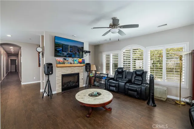 a bathroom with a granite countertop tub double vanity granite and a large window