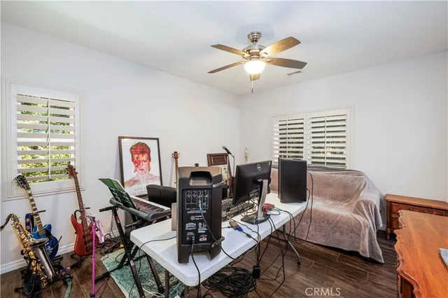 a view of a tree in front of a house