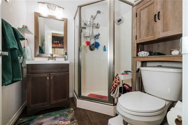 a view of a large trees in front of house