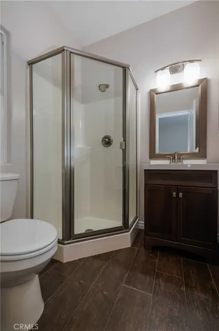 a kitchen that has a table and chairs in it