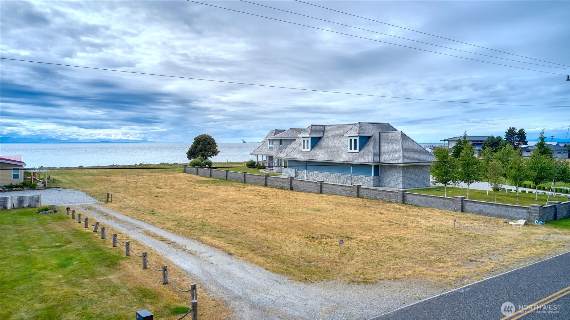 585 Marine Drive Point Roberts, WA 98281 - Photo 16 of 21 a view of a swimming pool with an ocean view