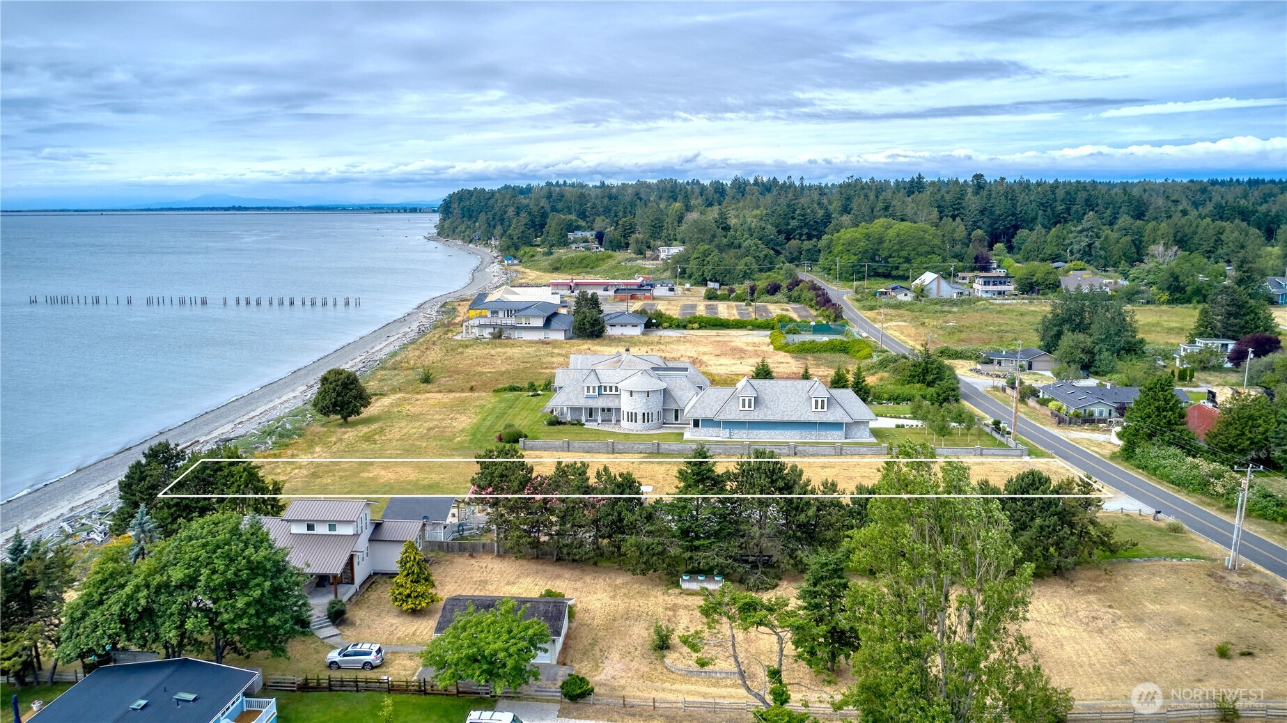 585 Marine Drive Point Roberts, WA 98281 - Photo 17 of 21 a view of a city with lawn chairs