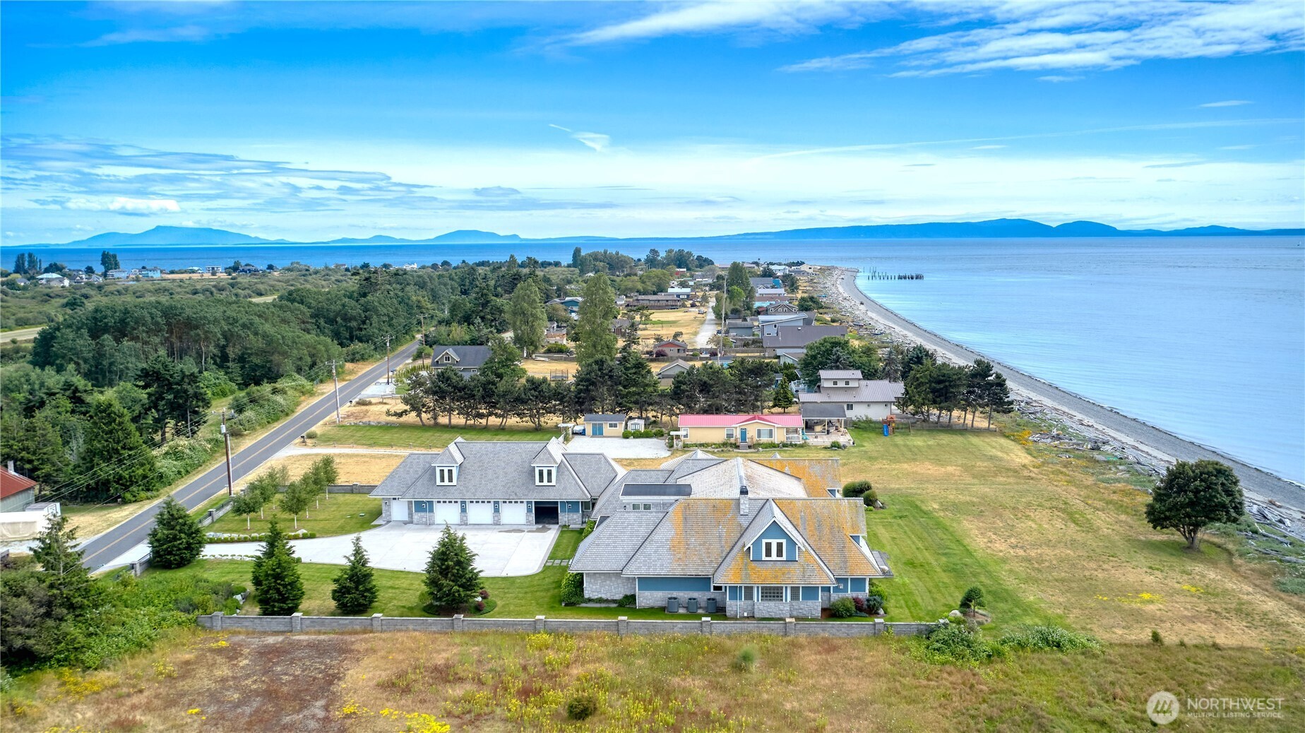 585 Marine Drive Point Roberts, WA 98281 - Photo 20 of 21 an aerial view of residential houses with outdoor space and ocean view