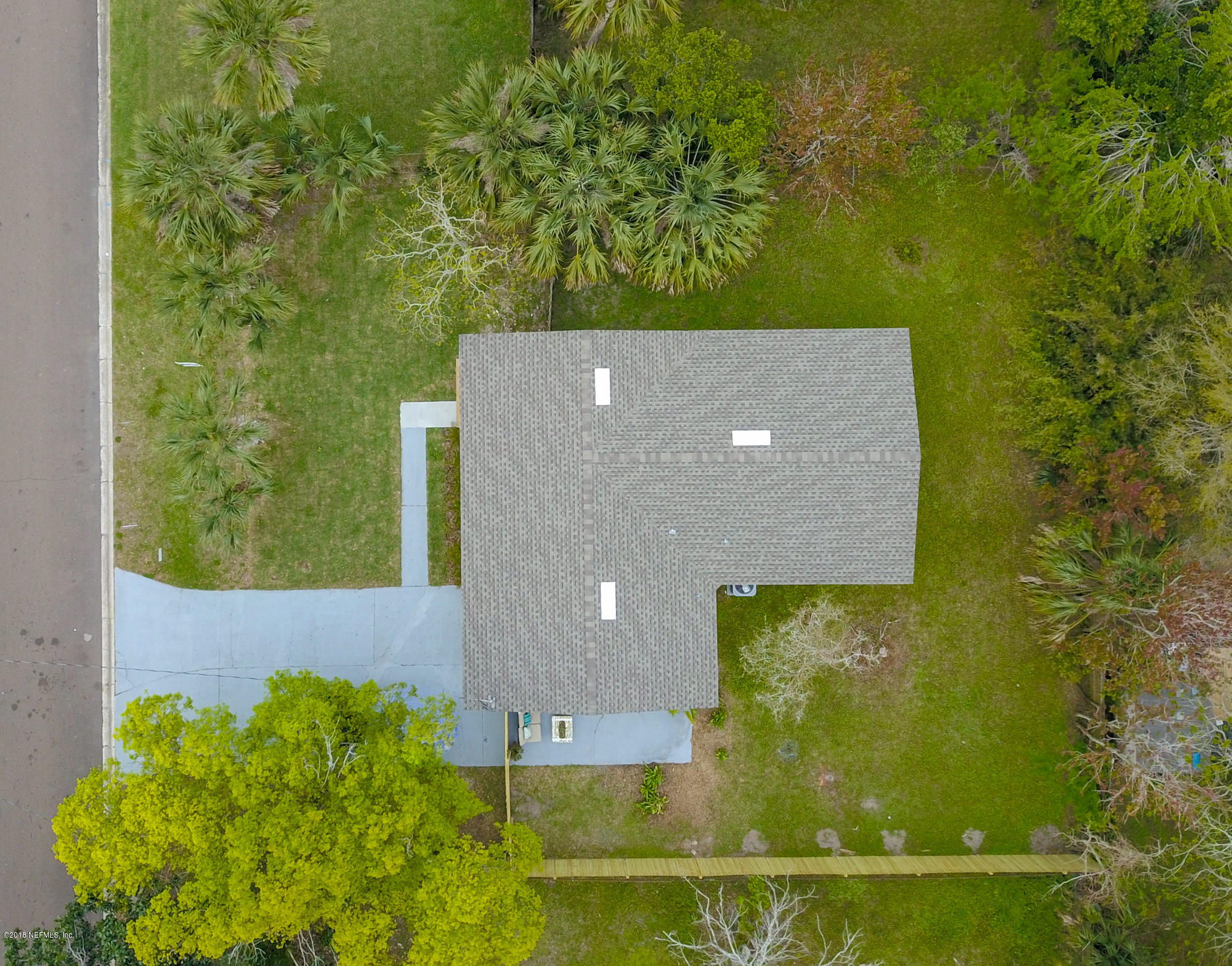 411 Skate Road Atlantic Beach, FL 32233 - Photo 24 of 26 view of a back yard
