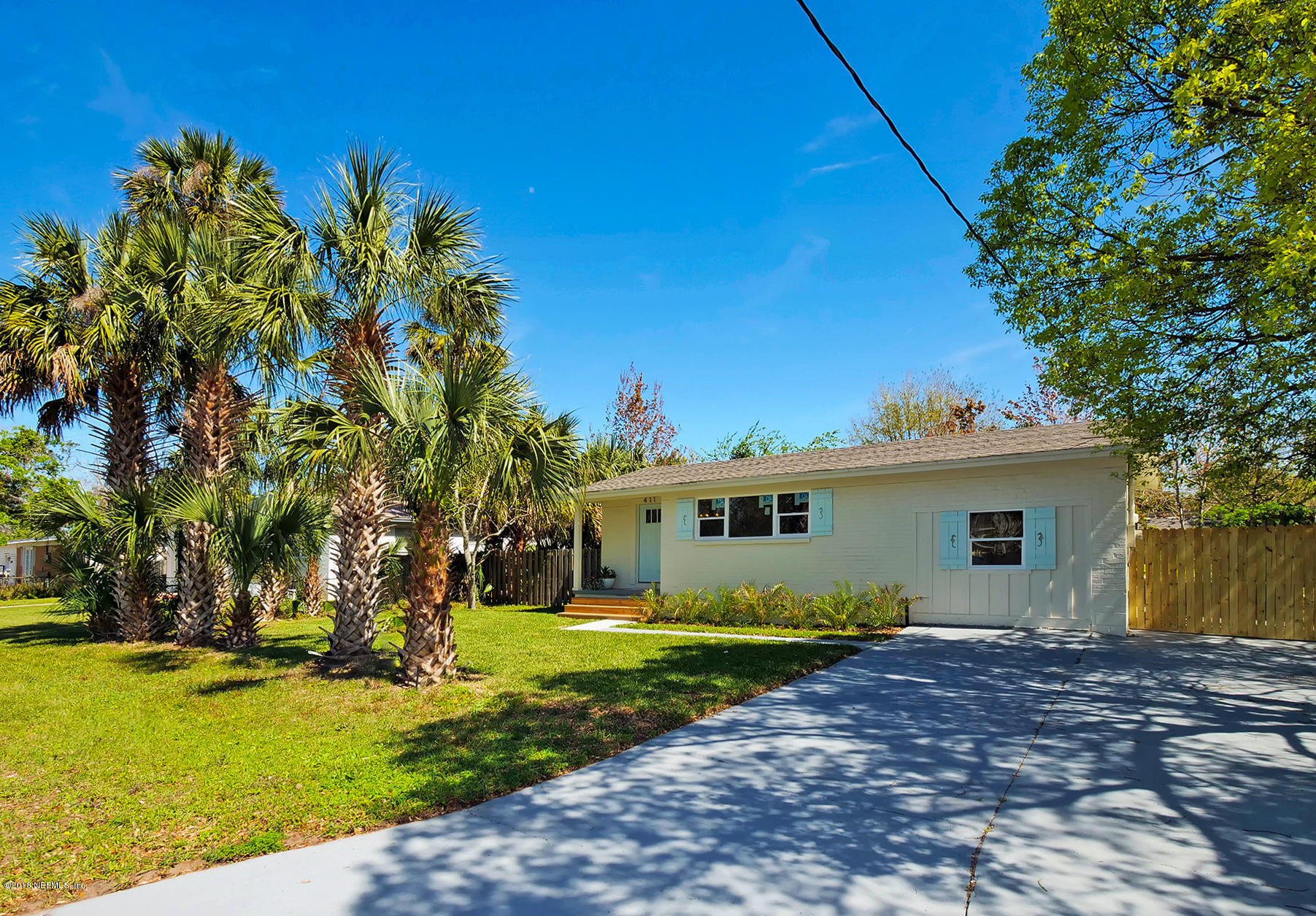 411 Skate Road Atlantic Beach, FL 32233 - Photo 3 of 26 a view of a house with a backyard